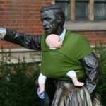 Fake Babies in Slings Are Showing Up on Statues of Men in the United Kingdom — Here’s Why