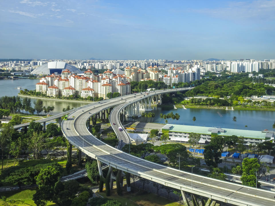 Singapore‌ downtown highway showcasing residential areas.